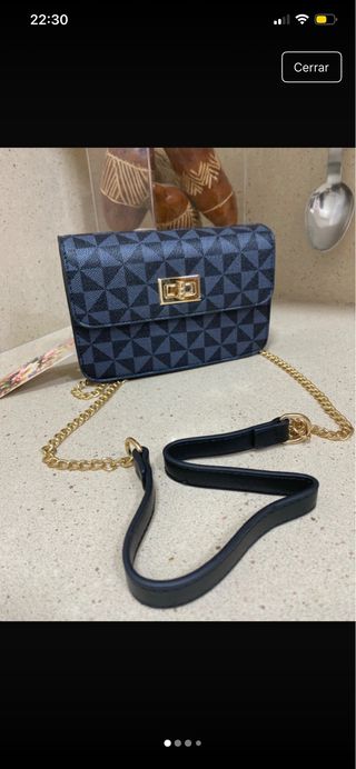 Mini bolso bandolera negro y dorado