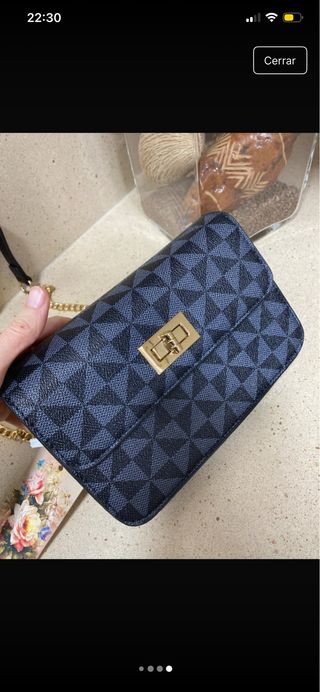 Mini bolso bandolera negro y dorado