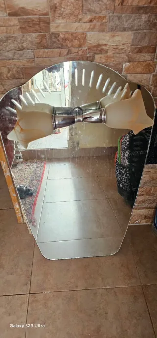 Espejo decorativo plateado y transparente