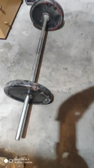 Barra con discos 25kg