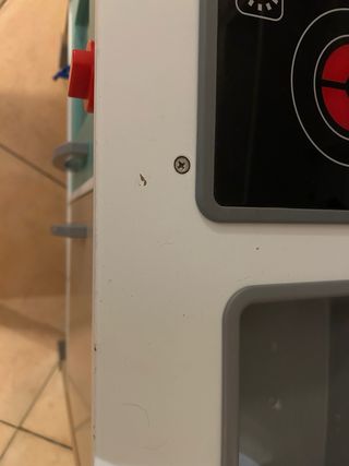 Cocinita de madera con accesorios