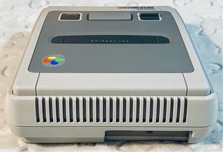 SNES PAL (A-/8.0) + 2x Mandos + Super Mario World