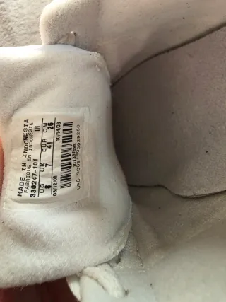 Zapatillas Nike Blancas y Plateadas