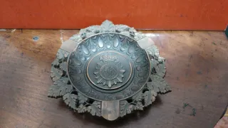 Cenicero con escudo del CNP