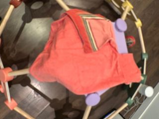 Toalla de tela naranja y rosa bebé