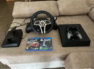 PS4 Pro 1TB+ Volante y un mando y mas de 5+ Juegos