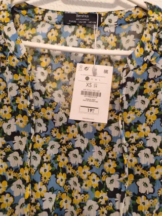 Blusa floral manga larga