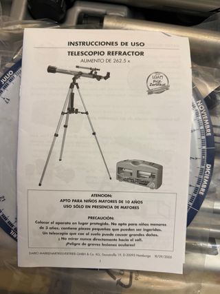 Telescopio con trípode y accesorios