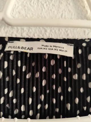 Vestido negro con lunares blancos