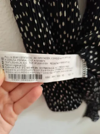 Vestido negro con lunares blancos