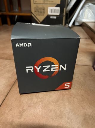 Caja AMD Ryzen 5 + disipador de origen