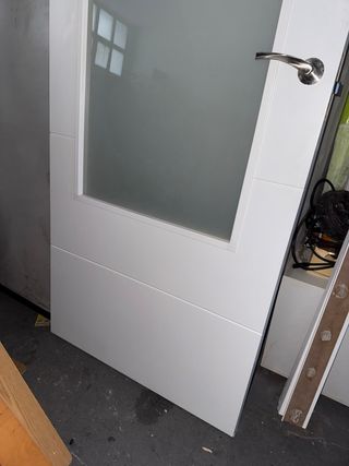 Puerta interior blanca con cristal