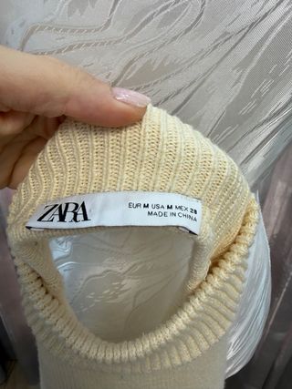 Jersey amarillo cuello alto lazo espalda