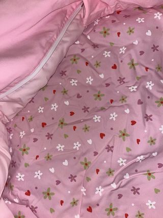 Minicuna bebé rosa con dibujo de niña