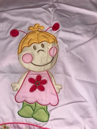 Minicuna bebé rosa con dibujo de niña