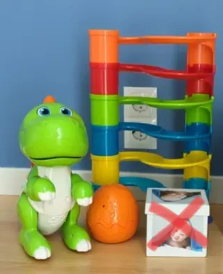 Juguete Dinosaurio y juego de de bolas