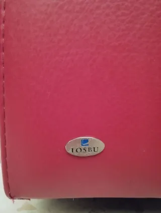 Sillón reclinable de piel rojo