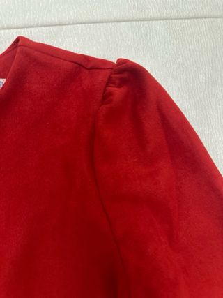 Mono corto niña efecto ante rojo