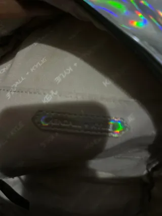Mochila plateada holográfica