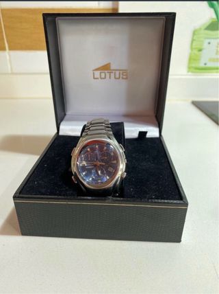 iPhone 6s (+ Cavo di Ricarica) e orologio LOTUS