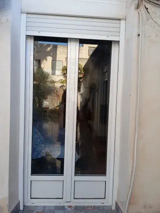 Puerta cristal aluminio 2 hojas