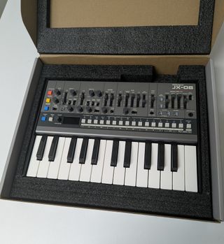 Roland JX-08 con Teclado K25M