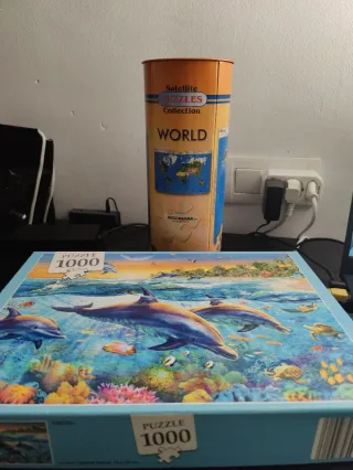 Puzle de delfines y mapamundi.