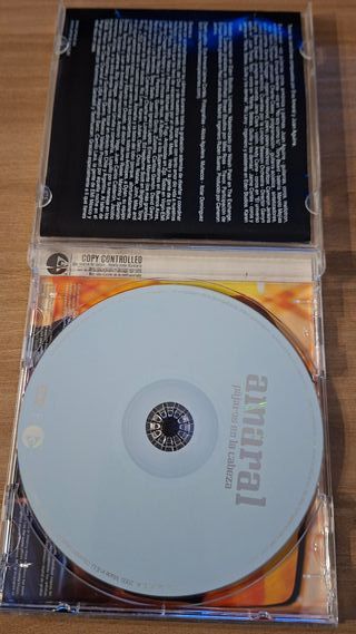 CD Amaral - Pájaros en la cabeza