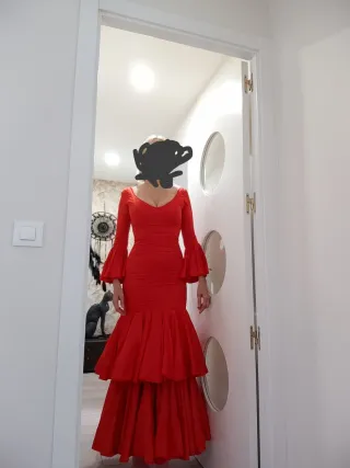 Traje de flamenca rojo volantes