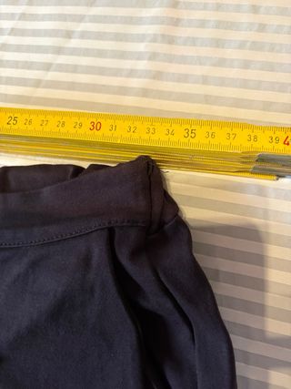 Pantaloni viola scuro con sovrapposizione