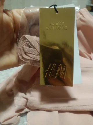 Vestido largo rosa con volantes