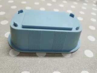 Bañera y espejo para pájaros.