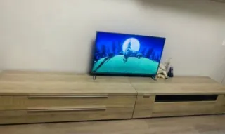 Mueble de salón modular beige y blanco