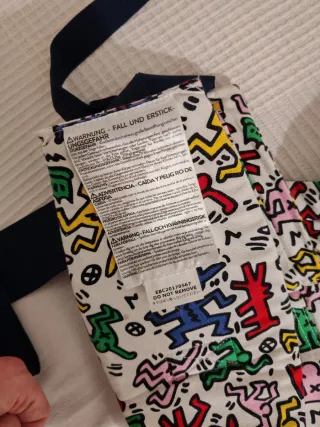 Mochila Ergobaby Porteo Keith Haring