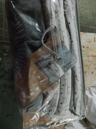 Edredón y chichonera cuna bebé león