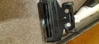 Aspiradora Escoba Gris y Blanca