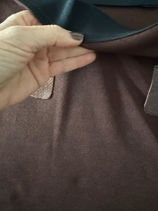 Falda marrón Burdeos punto con bolsillos cuero.