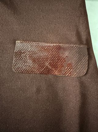 Falda marrón Burdeos punto con bolsillos cuero.