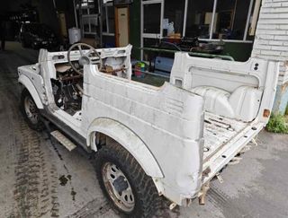 Suzuki 14111830 colector escape samurai 1.3 216000