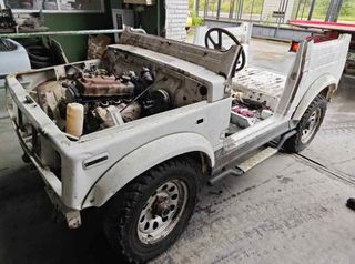 Suzuki 14111830 colector escape samurai 1.3 216000