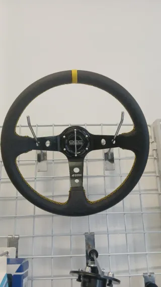 Volante deportivo Occ desplazado