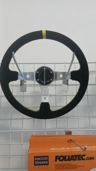 Volante deportivo Occ desplazado