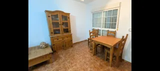 Mesa de comedor extensible con 4 sillas