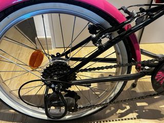 Bicicleta infantil rosa y negra