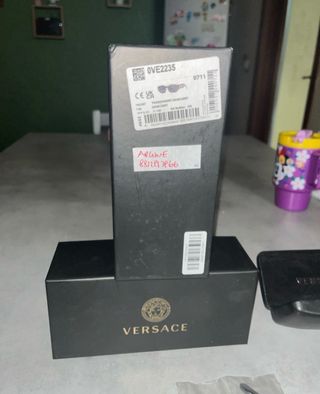 Occhiali Versace neri e oro