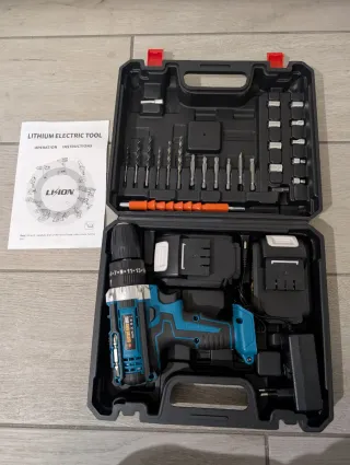 Trapano avvitatore a percussione con 2 batterie