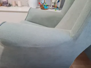 Sillón de lactancia mecedora verde