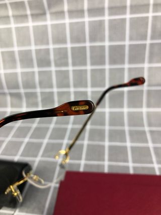 Gafas Cartier al aire con estuche y caja