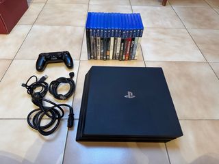 PS4 Pro Negra + Mando + 16 Juegos