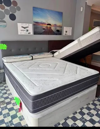 Canapé abatible gris y blanco